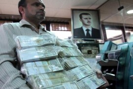 نظام الأسد يصادر الدولارات من المنازل.. والليرة تهبط إلى سعر قياسي